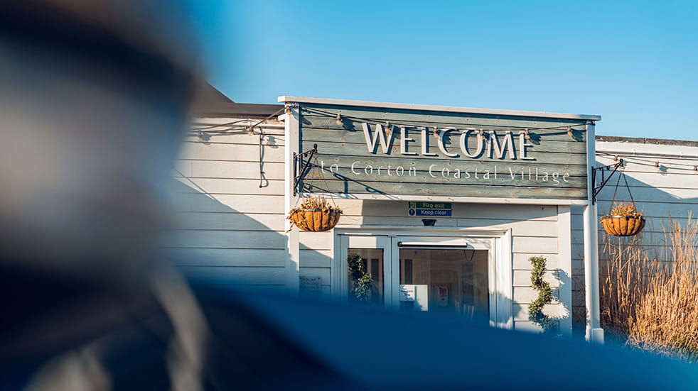 Sign of Warner Hotel's Corton Coastal Village
